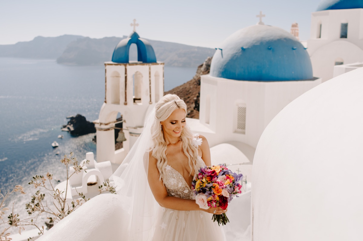 ethnic-destination-wedding-santorini-phosart-photographergreece-Bride-photography-blue-domes-greek-island